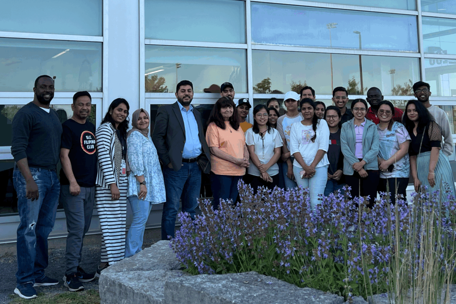 The Healthcare Policy class is seen standing outside the Kingston campus Indigenous Centre